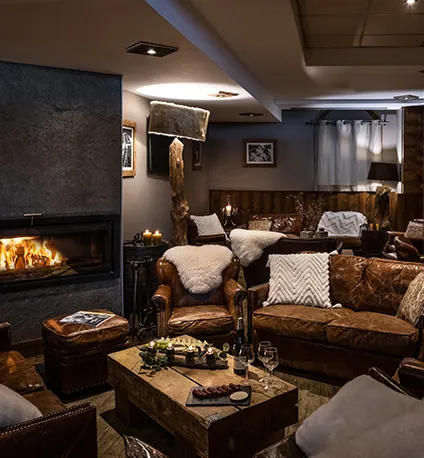 Coin lounge du bar de l'hôtel Ski Lodge à Val d'Isère